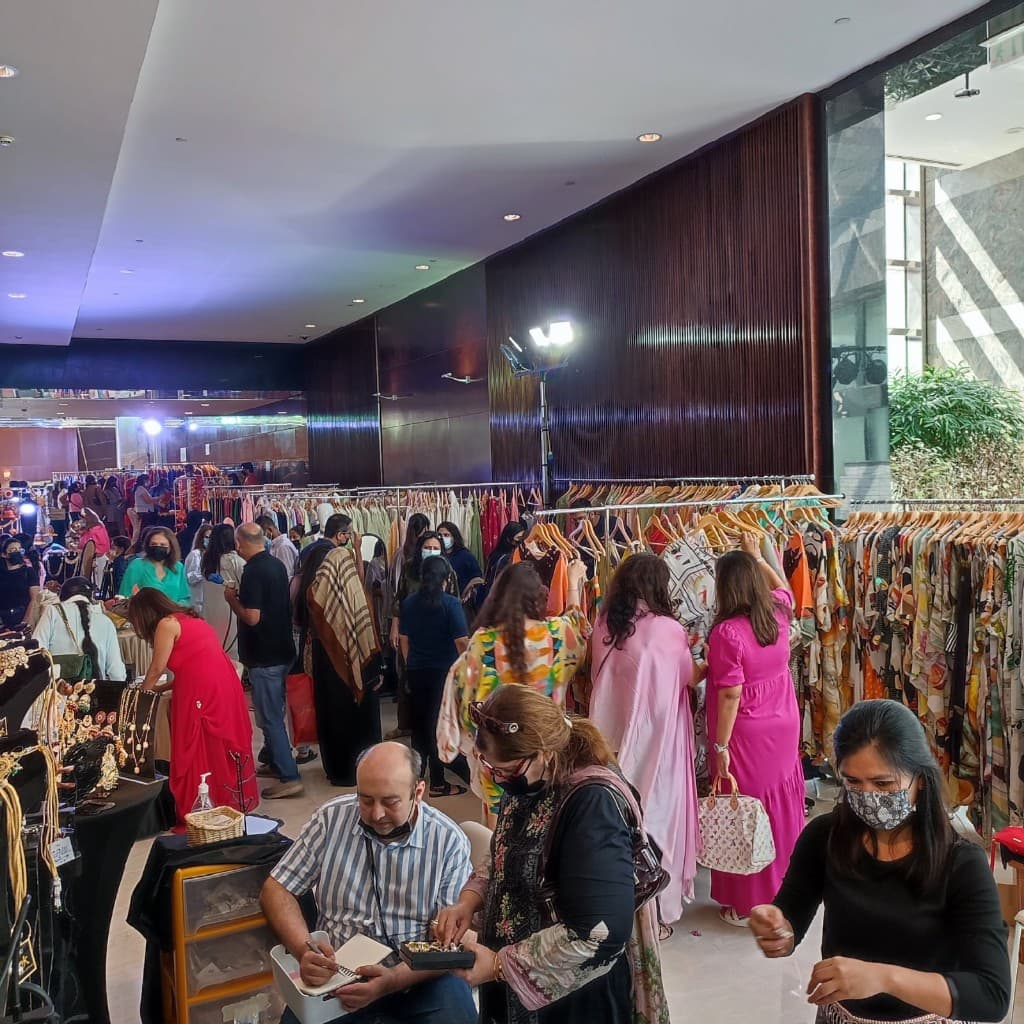 Past Sopritti edition — busy floor with fashion and jewellery displays